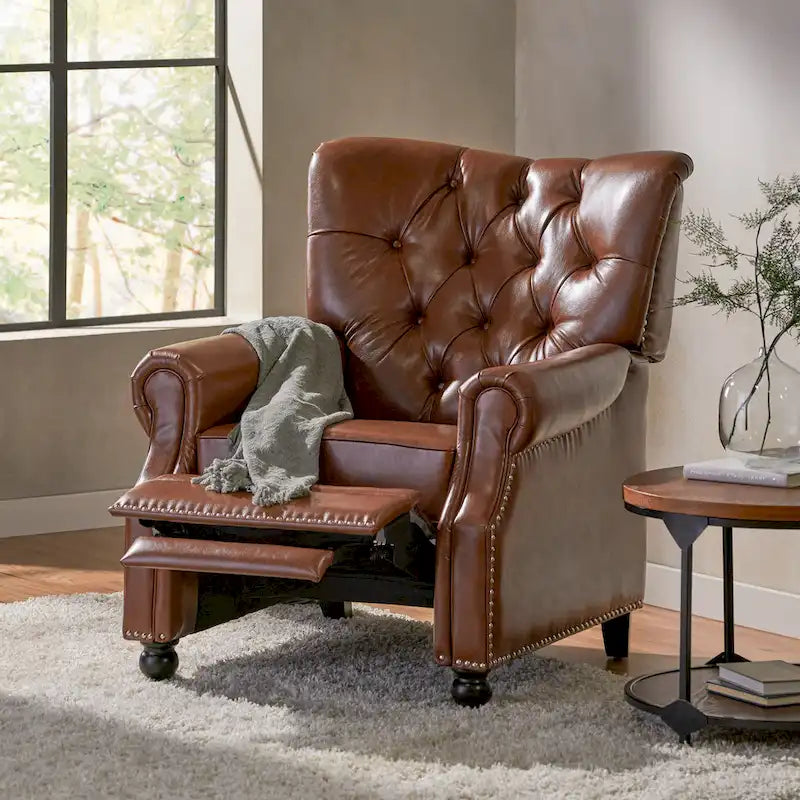 Relaxfauteuil met achteroverduwmechanisme, voetensteun, knopenrug en spijkerkopafwerking