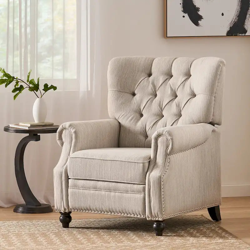 Relaxfauteuil met achteroverduwmechanisme, voetensteun, knopenrug en spijkerkopafwerking