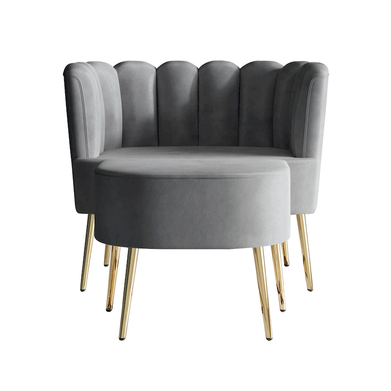 Luxe gestoffeerde fauteuil van fluweel met voetenbank