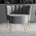 Luxe gestoffeerde fauteuil van fluweel met voetenbank