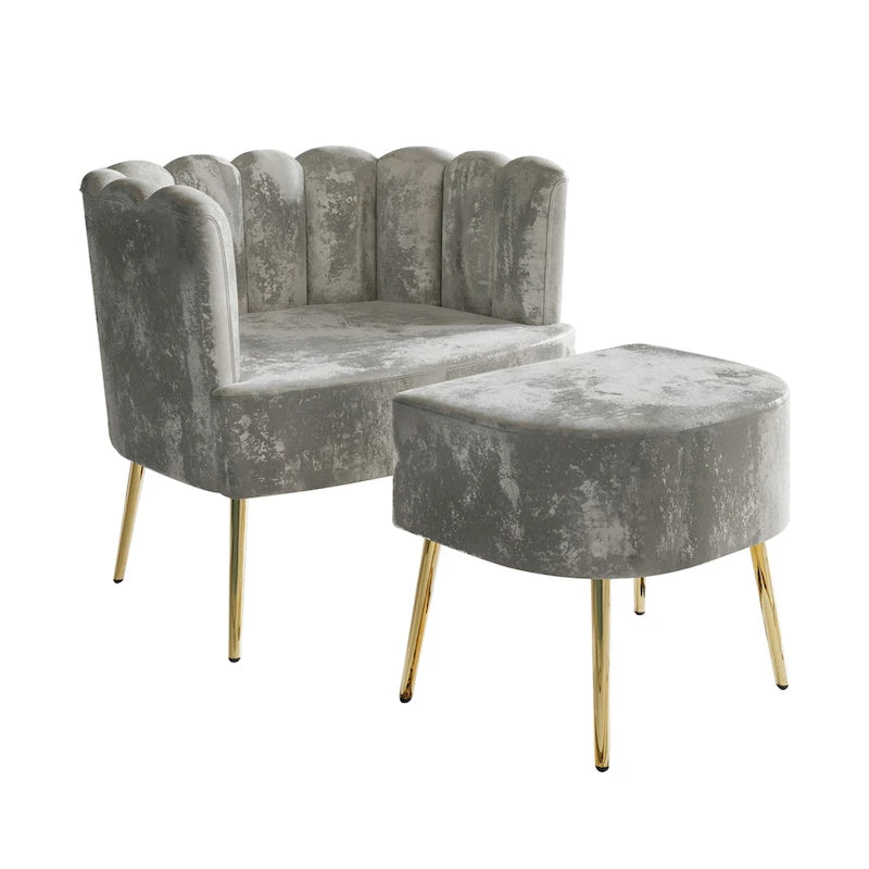 Luxe gestoffeerde fauteuil van fluweel met voetenbank